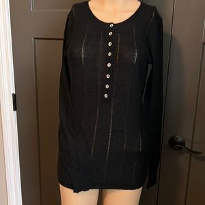 Women’s tunic sweater.